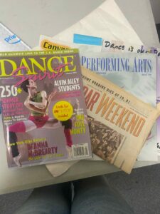 A stack of magazines and newspapers