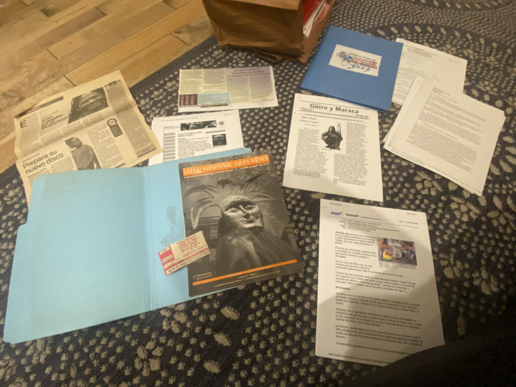 Various materials and a folder spread out